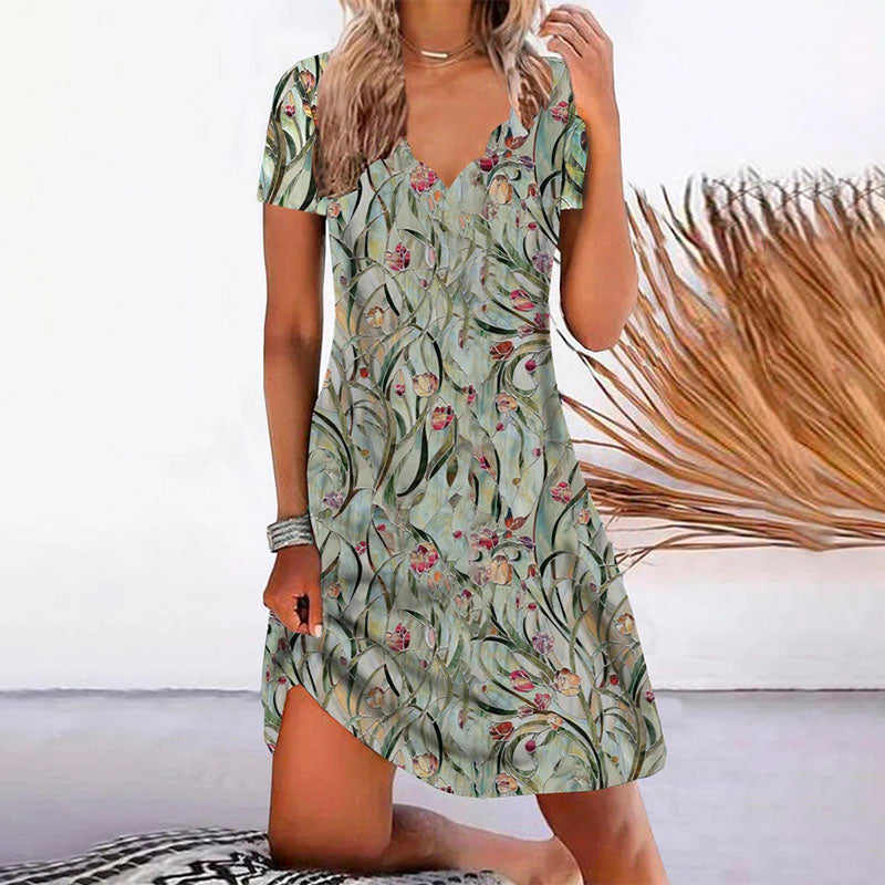 Kleid mit V-Ausschnitt und kurzen Ärmeln und Blumenmuster